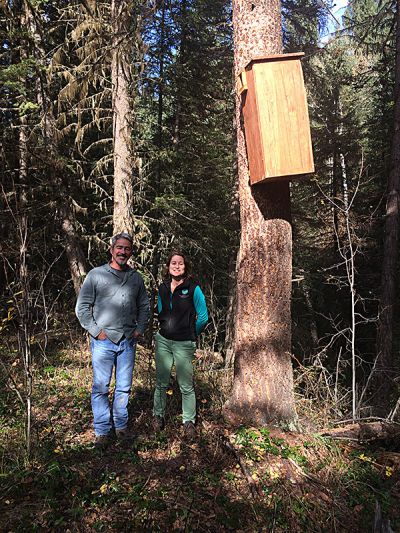 HCTF biologist Kathryn Martell and Larry Davis pose for a photo after putting the ladder away.